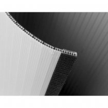 Närbild på kardborre som håller ihop mässdisk