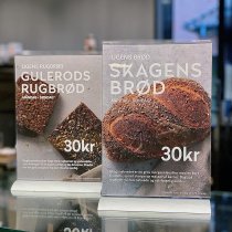 Menyhållare SwingWing på disk med prisskylt